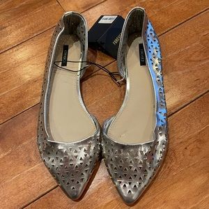 Point toe flats.  Silver color.  Forever 21 Brand New.  7.5 US SIZE